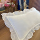 White ruffles pillow