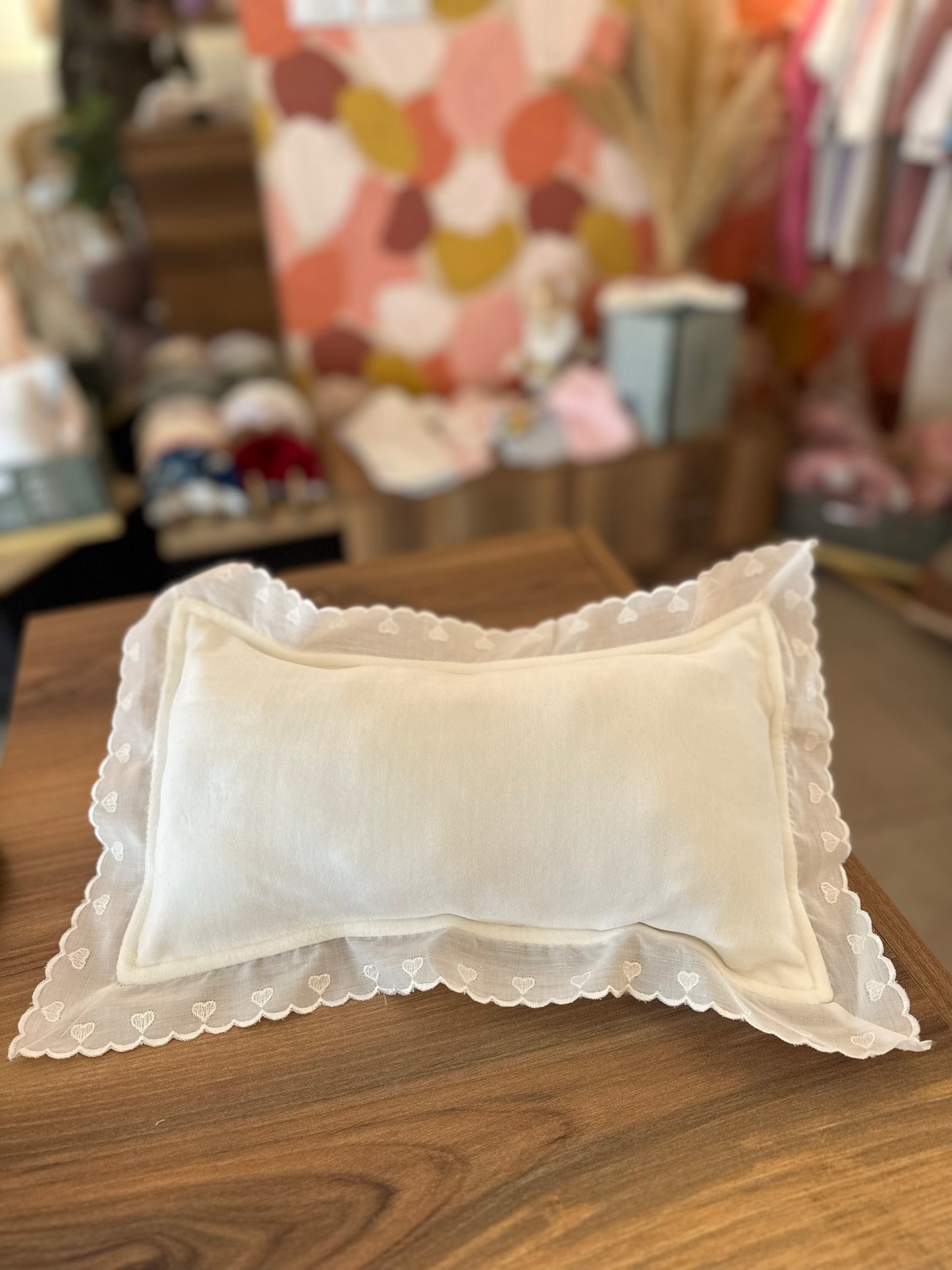 White ruffles pillow